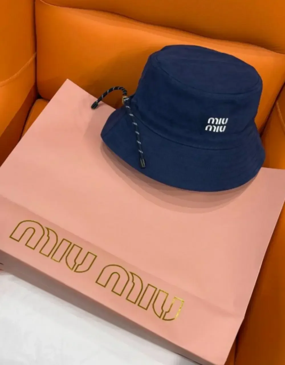 Miu Miu Navy Blue Logo Embroidered Bucket Hat with Drawstring